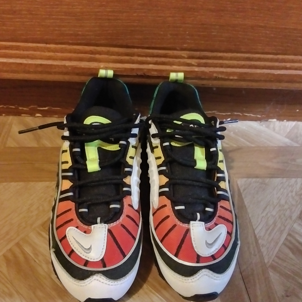 Nike Red and Yellow Sneakers with Bold Design